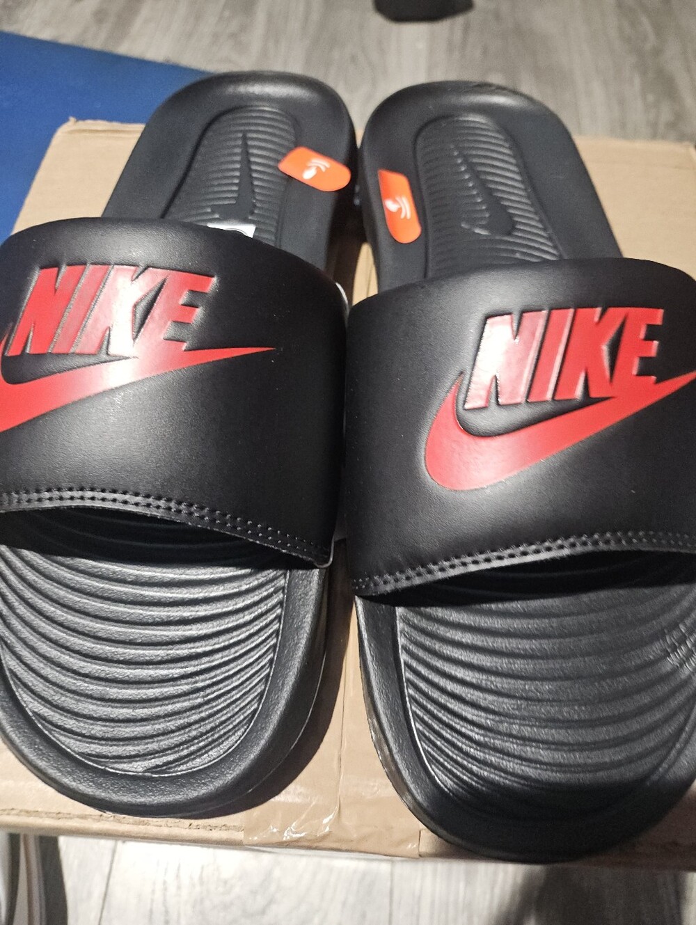 Nike Black Slide Sandals with Red Logo